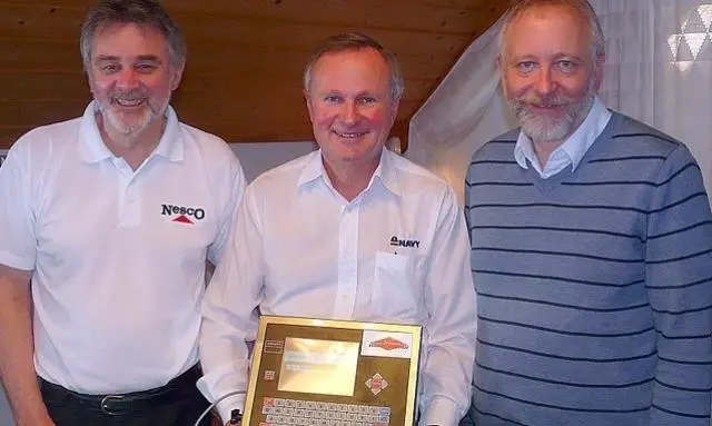 (Left to right) Gordon Norman technical sales director Nesco Weighing Ltd UK, Per Andresen chief executive Navy Group Norway and John-Sigurd Solberg Ocean Electronics Norway after the agreement was signed together with a Wavecheetah II touch scr...