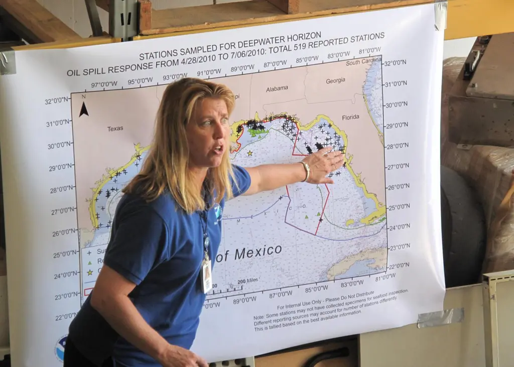 NOAA has been testing seafood in the Gulf of Mexico since late April 2010. This photo, taken in the summer of 2010, shows Dr Lisa Desfosse, Director of NOAA's Southeast Fisheries Science Center Mississippi Laboratories, explaining where and how ...
