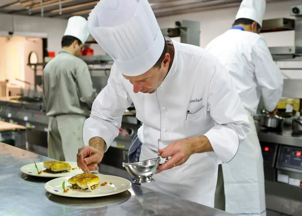 Lionel Rigolet prepares food during the WWF/Euro-Toques event in Brussels. © Jock Fistick/WWF