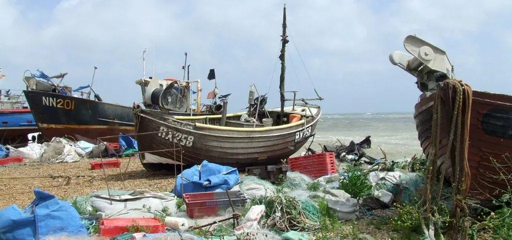 Fishing boats on Hastings beach attract many tourists