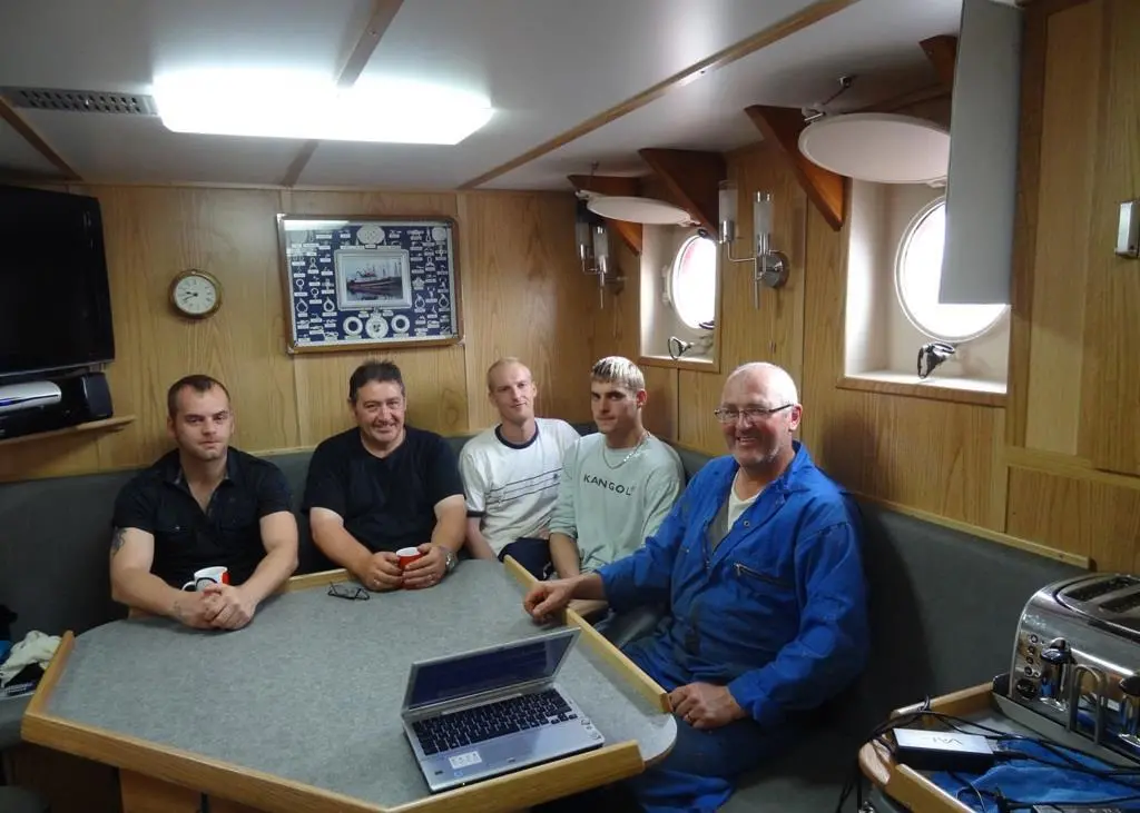 The Amity's crew on completion of their vessel's risk assessment, still smiling. From left to right: Christopher Brown, Jimmy Buchan, James Gemmill, Jamie McLaverty, and Geoff Philips