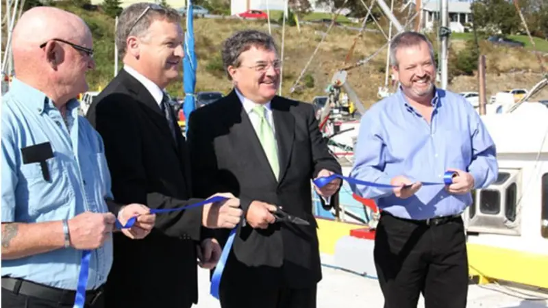 Jim Flaherty, Minister of Finance, Senator Fabian Manning, Don Drew, president of the Bay Bulls Harbour Authority (r) and Fred Williams, vice president of the Bay Bulls Harbour Authority (l) officially opened newly reconstructed Small Craft Harb...