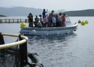 Delegates at the fish farm during the Offshore Mariculture Conference 2010