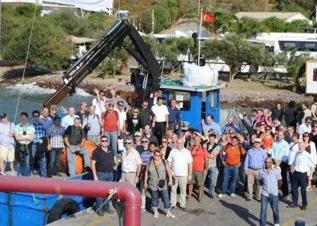 Group shot of delegates on the visit to the exposed fish farm sites