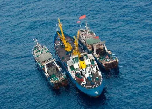 Fish transhipment at sea. © Environmental Justice Foundation