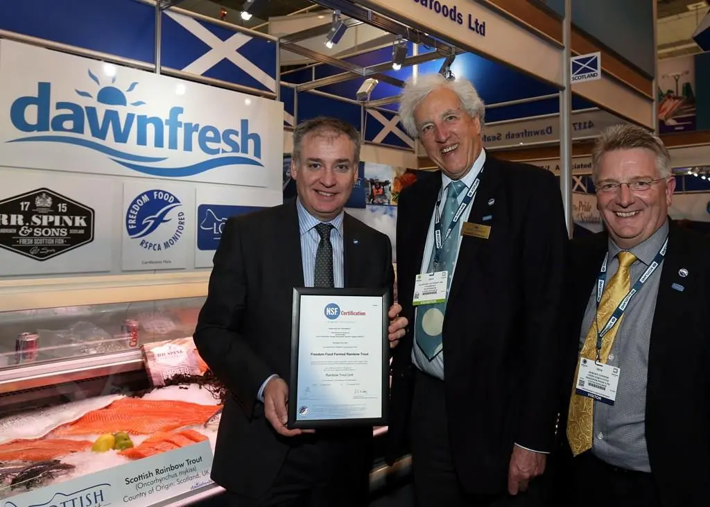 L-R: Richard Lochhead MSP, Cabinet Secretary for Rural Affairs and the Environment; Alastair Salvesen CBE, Chairman of Dawnfresh; and Jeremy Cooper, Freedom Food Chief Executive, at European Seafood Expo in Brussels
