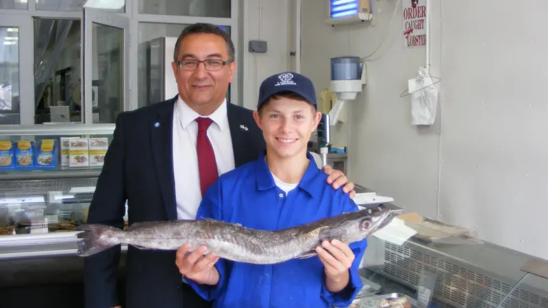 Christian Allard MSP (left) at J. Charles with  Henry Charles a fourth generation fish merchant in Torry