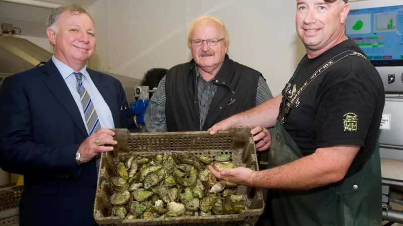 (L-R) Robert Goguen, Parliamentary Secretary to the Minister of Justice and Member of Parliament for Moncton – Riverview – Dieppe; PEI Minister of Fisheries, Aquaculture and Rural Development, Ron MacKinley; and General Manager of Raspberry Poin...