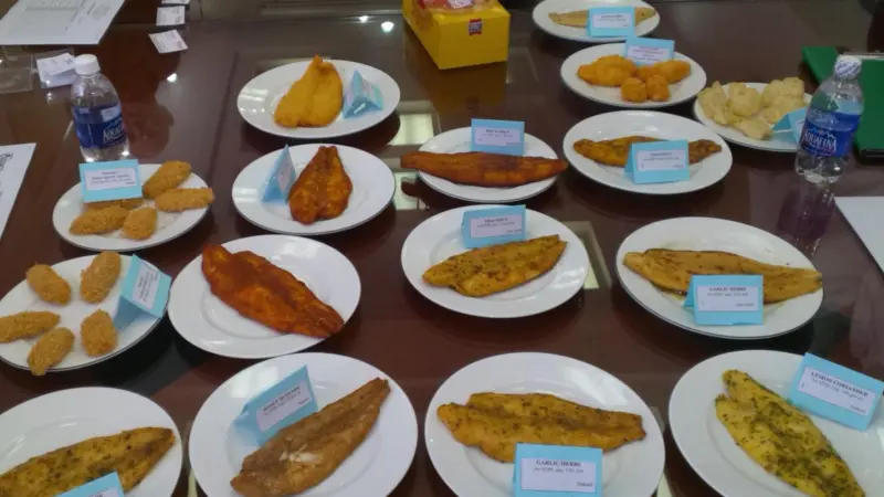 Marinated and breaded pangasius at a pangasius tasting at the Godaco Pangasius Processing Factory in Vietnam