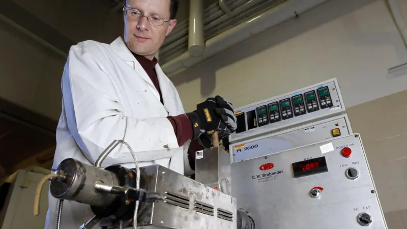 Kurt Rosentrater uses corn and soy to produce fish food used at SeaWorld in San Diego. Photo by Christopher Gannon