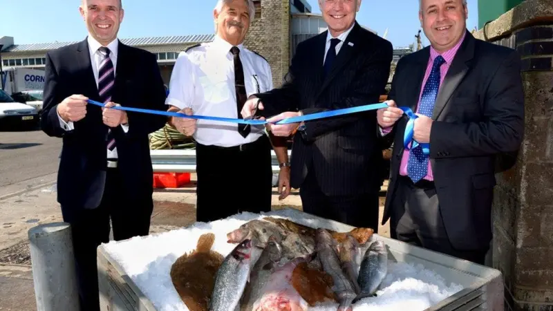 Jason Schofield, Chief Executive of Sutton Harbour Holdings plc; Pete Bromley, Manager of Plymouth Fisheries; Peter Hartland, Chief Executive of Plymouth Chamber of Commerce; Richard Stevens, Chairman of Plymouth Chamber of Commerce officially o...