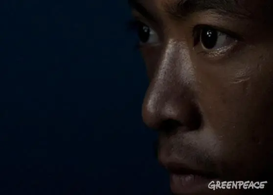 21 year old worker forced to work on a fishing boat with no way to return to his homeland. © Ardiles Rante/Greenpeace