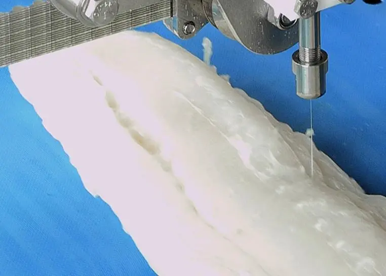 Marel’s FleXicut is a trimming robot for high precision bone detection and removal