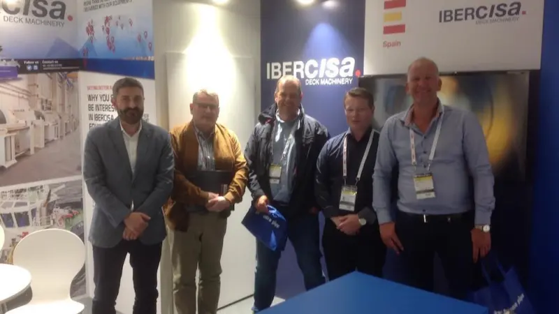 Knut Inge and Henrik Ostervold with staff from Ibercisa and northern European agent KSS at Nor-Shipping, where the contract to supply the new pelagic vessel was signed
