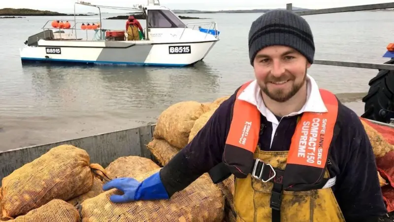 Fisherman wearing a Personal Flotation Devices