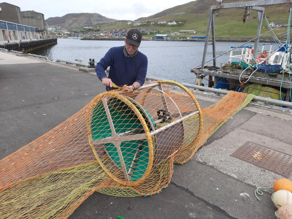 Smartrawl device being fitted into trawler net