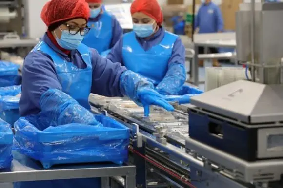 Seafood processing workers