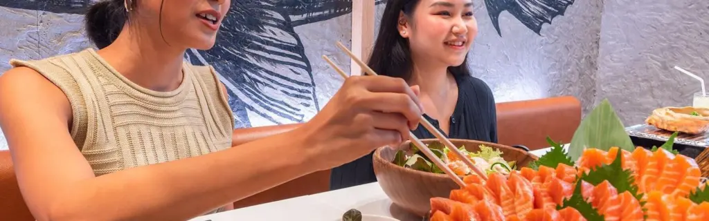 People enjoying seafood