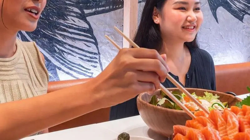 People enjoying seafood