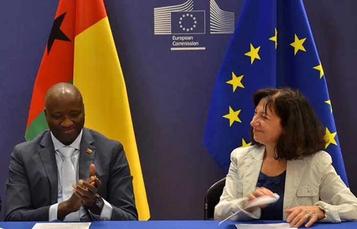 The image shows Charlina Vitcheva, Director-General for Maritime Affairs and Fisheries and Mário Musante da Silva Loureiro, Minister of Fisheries and Maritime Economy of Guinea-Bissau, signing the new implementing protocol for the SFPA