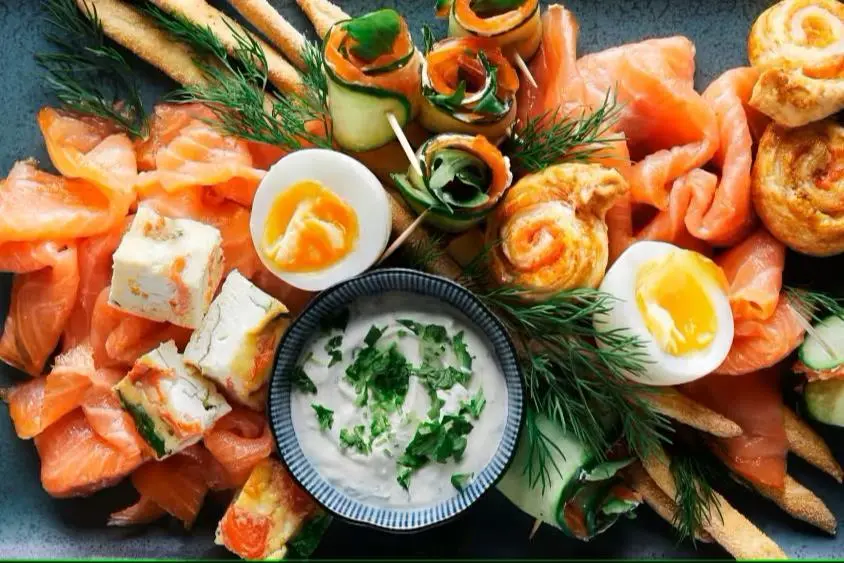 Salmon platter with mayonnaise and boiled eggs