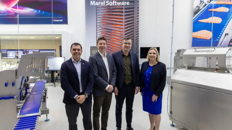 The image shows representatives from JBT Marel and Ace Aquatec