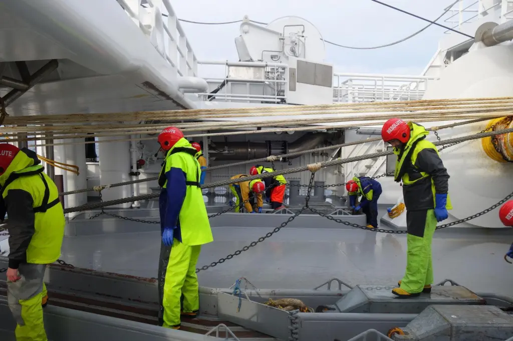 Crew of the Resolute releasing their trawl