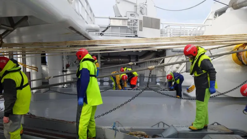 Crew of the Resolute releasing their trawl