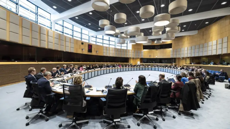 Delegates at a European Commission meeting sitting in a large oval