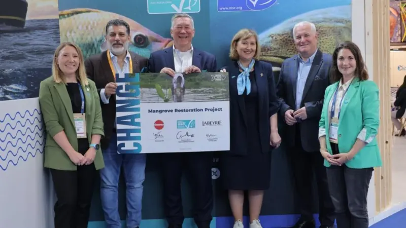 Members of ASC, Omarsa and Labeyrie Fine Foods celebrate their partnership to support Ecuador's mangrove forest