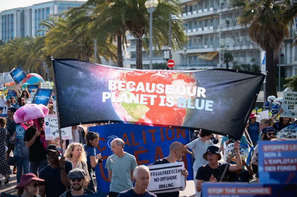 People marching to save the oceans from overfishing and climate change