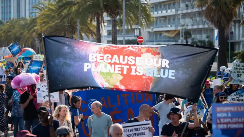 People marching to save the oceans from overfishing and climate change