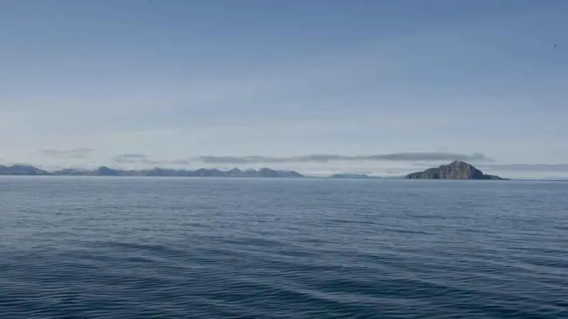 ocean with land in the background