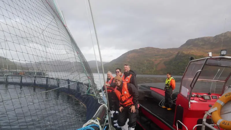 Tour guests visited a MOWI salmon farm on a loch