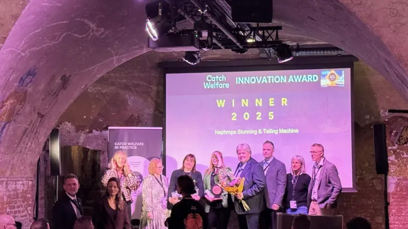 Members of Optimar winning the Catch Welfare Innovation Award for a nephrops stunning and tailing machine