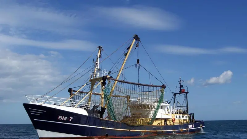 A generic image of a fishing trawler on the water