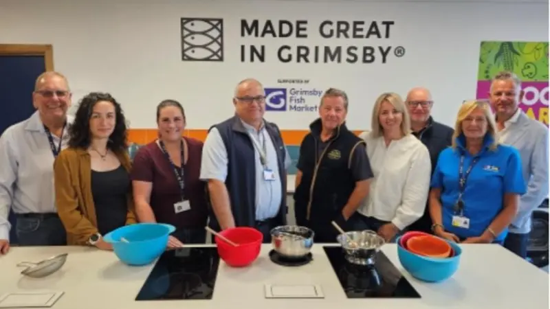 Trustees of the Horizon Youth Group welcome members of New England Seafood International and Made in Grimsby