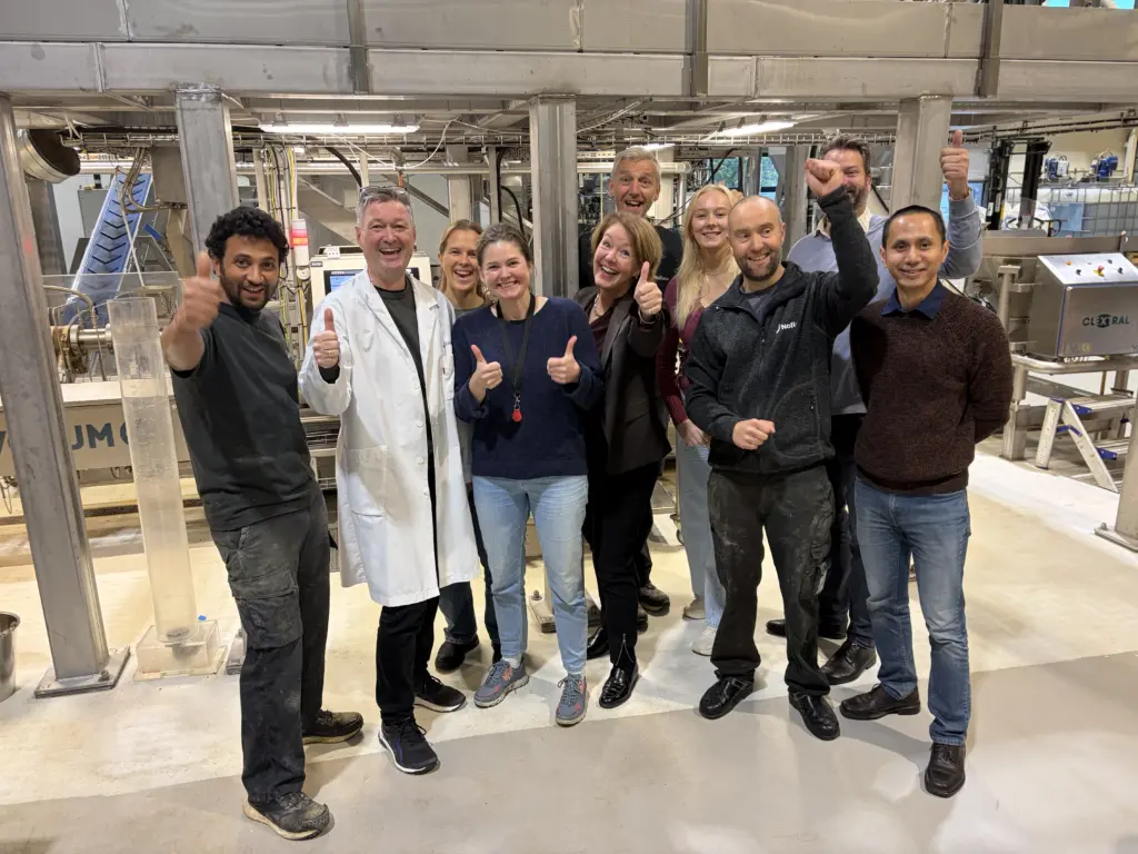 Nofima workers celebrating an award of NOK1.24 billion to fund aquafeed research.