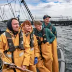 Members of Loch Duart on board a fishing vessel