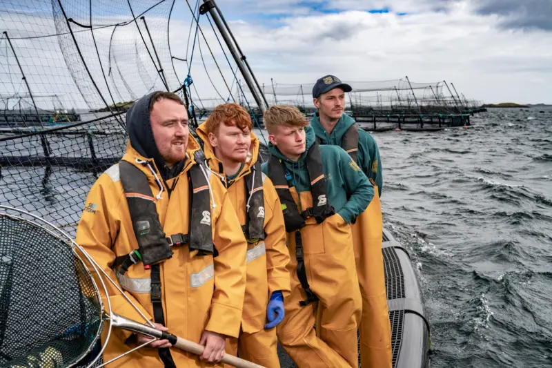 Members of Loch Duart on board a fishing vessel